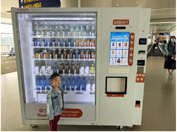 A vending machine that uses facial recognition for payment A vending machine that uses facial recognition for payment